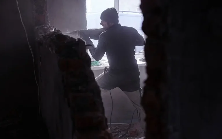 a man in a dark room